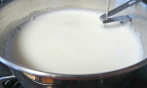 Heated milk in pot