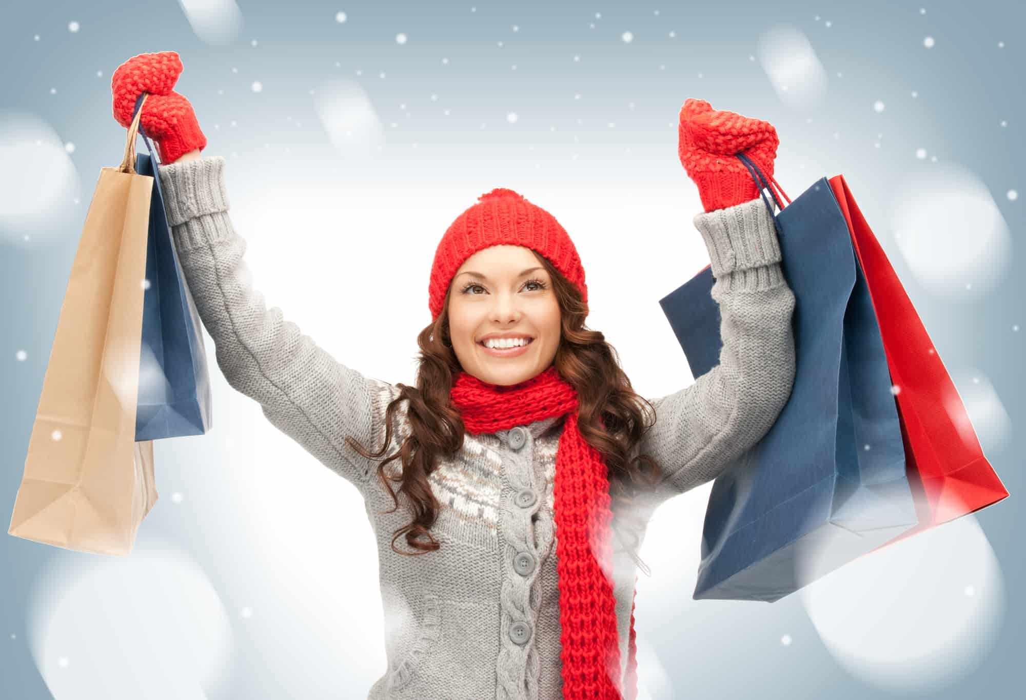 woman with christmas shopping bags