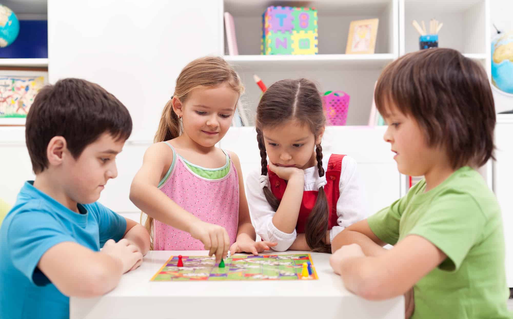 Kids playing board game