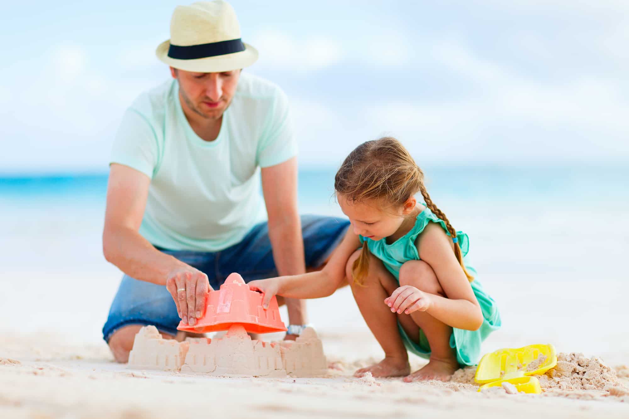 Father and daughter at beach