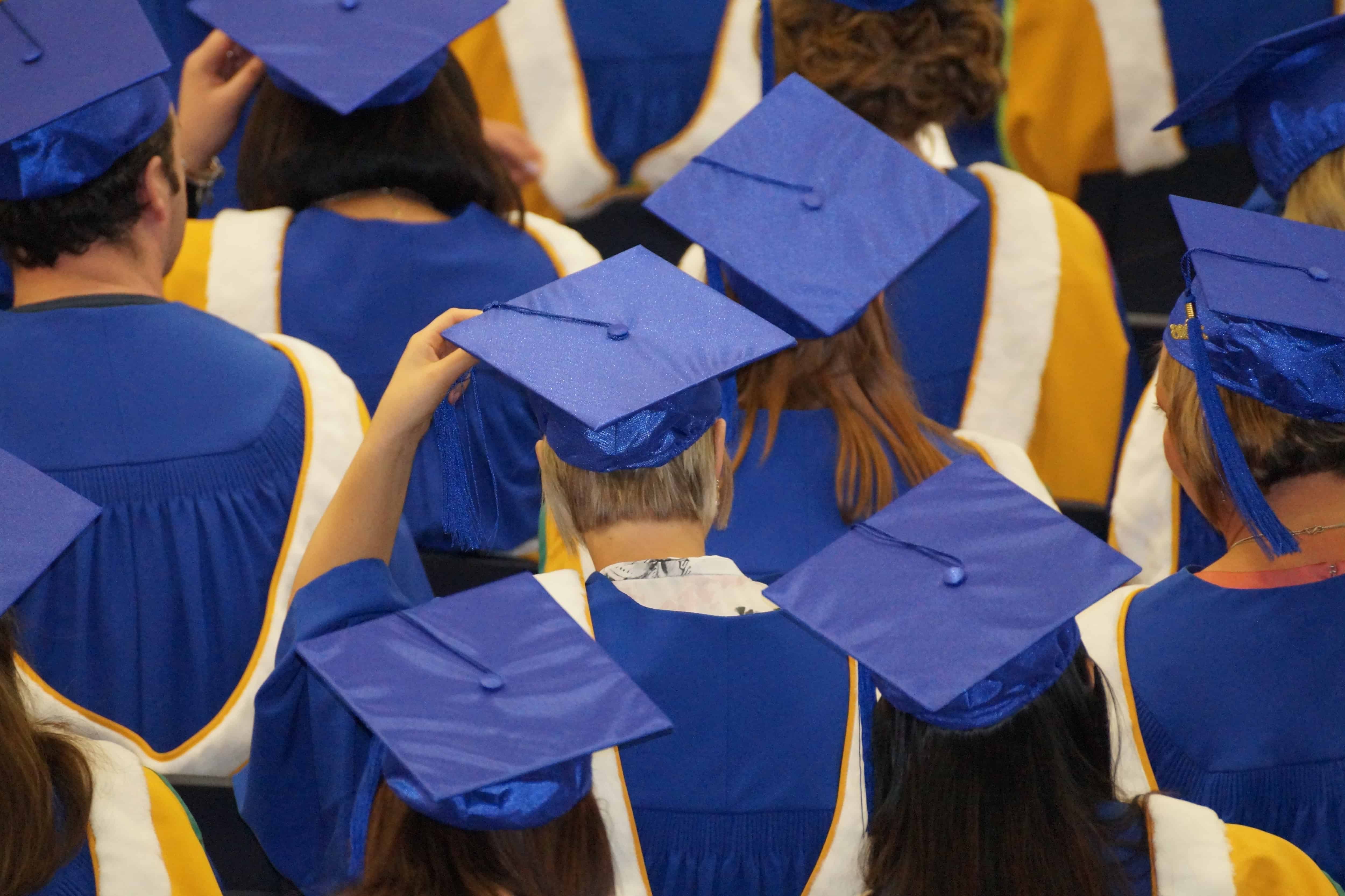 College graduation with students