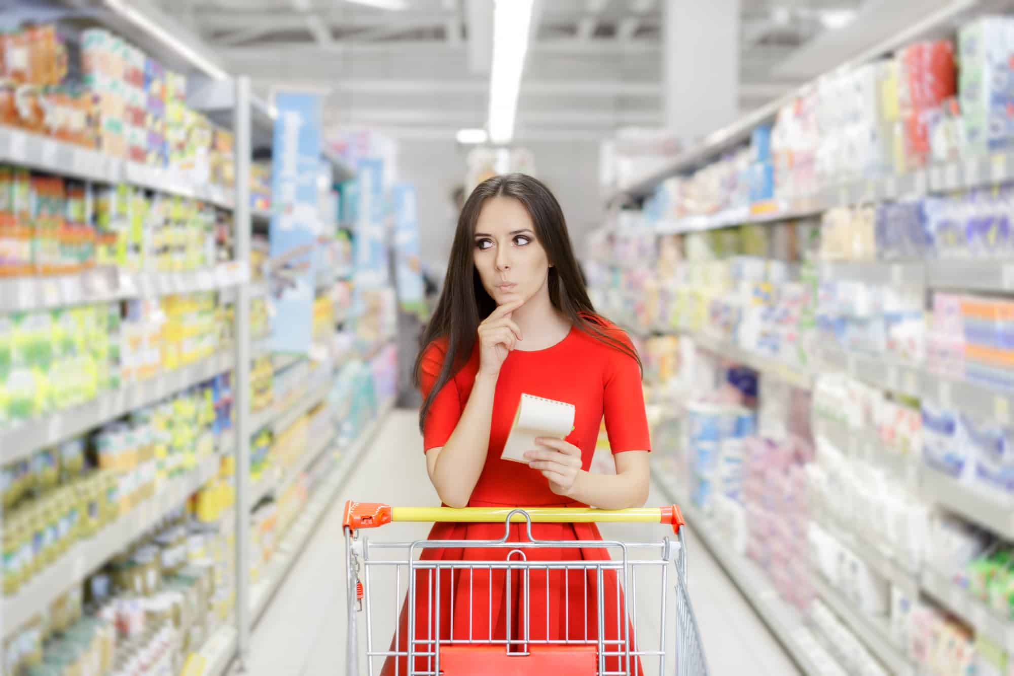 Curious Woman in the Drugstore with Shopping List