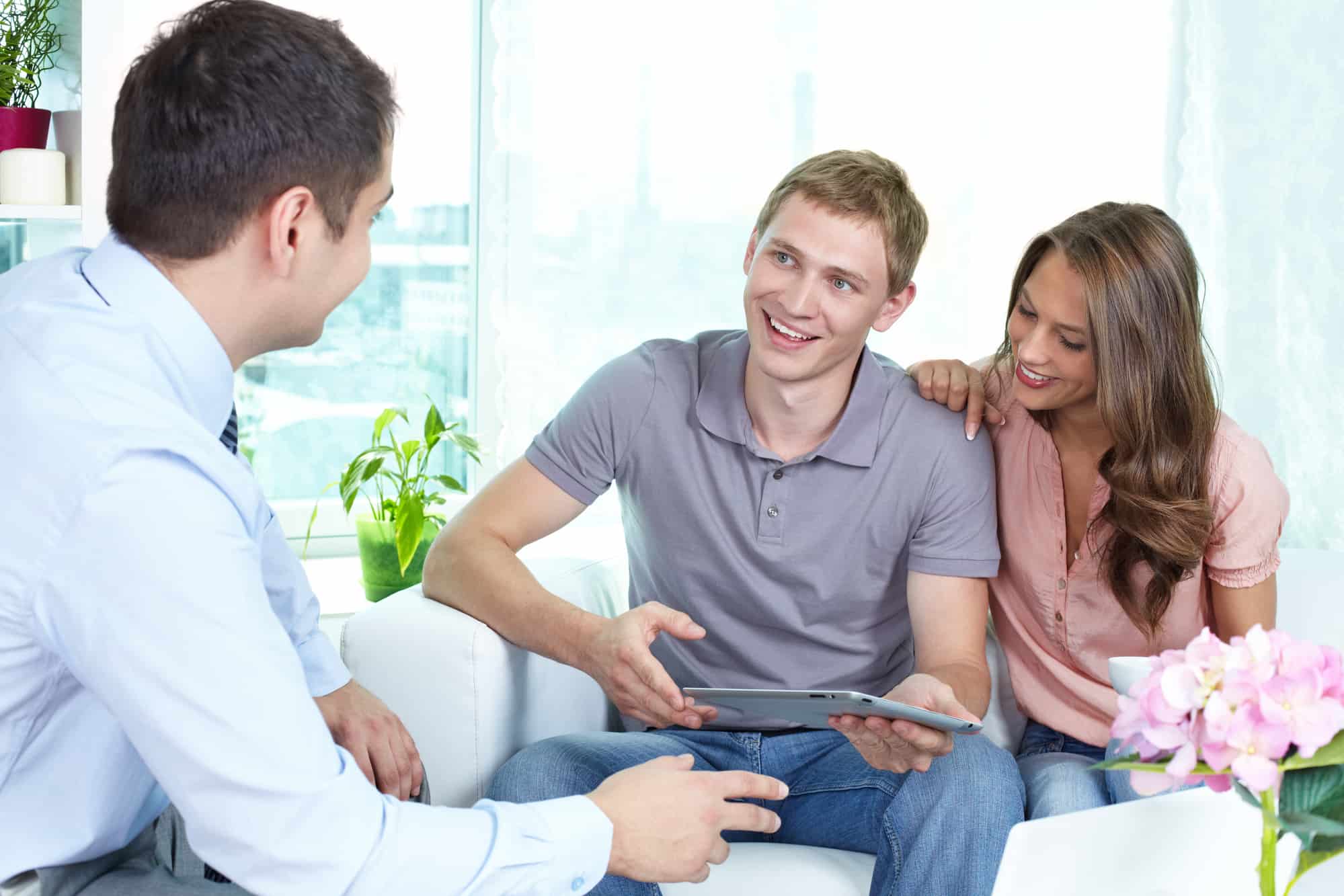 Man and woman meeting with professional