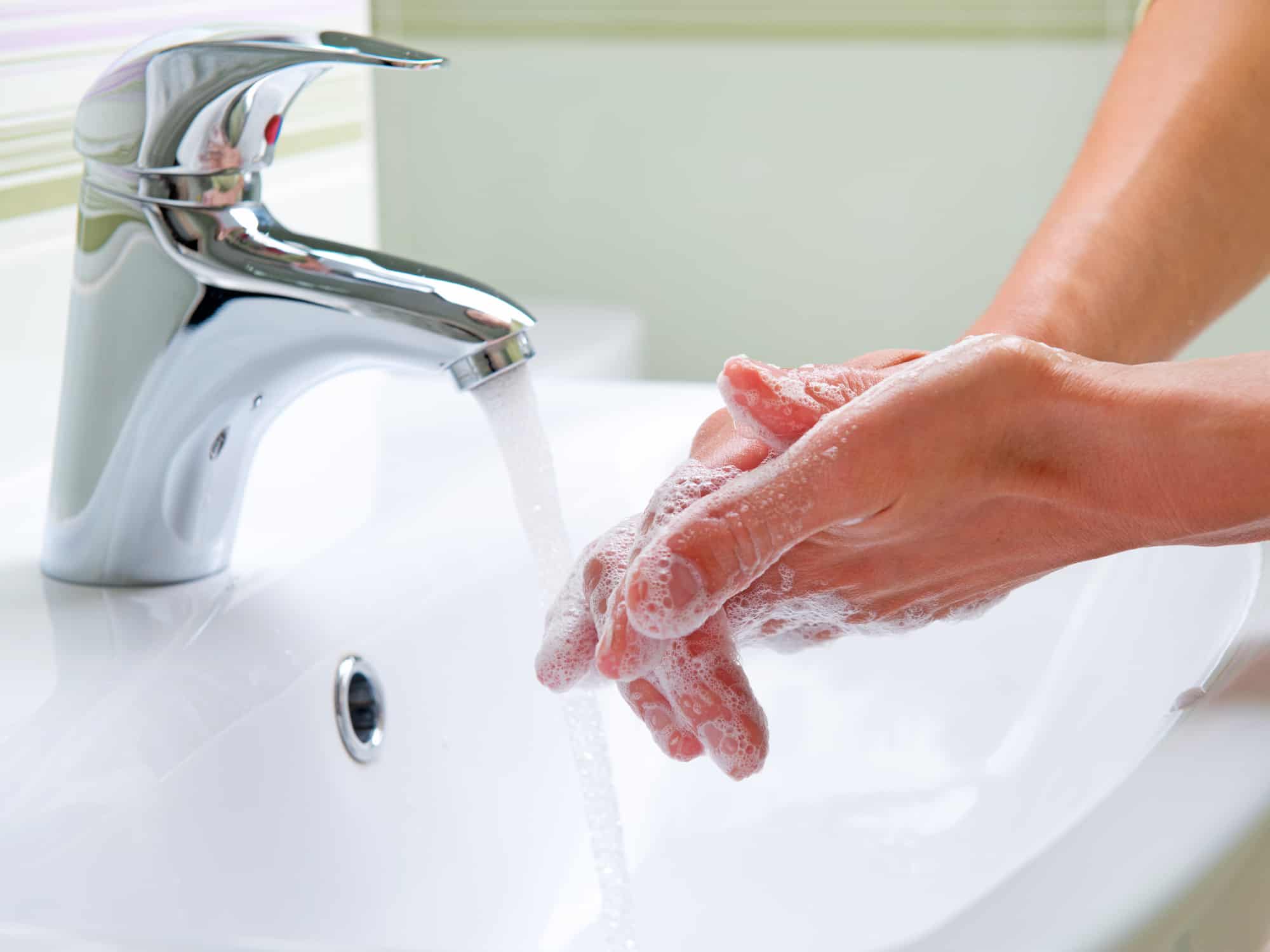 woman washing her hands